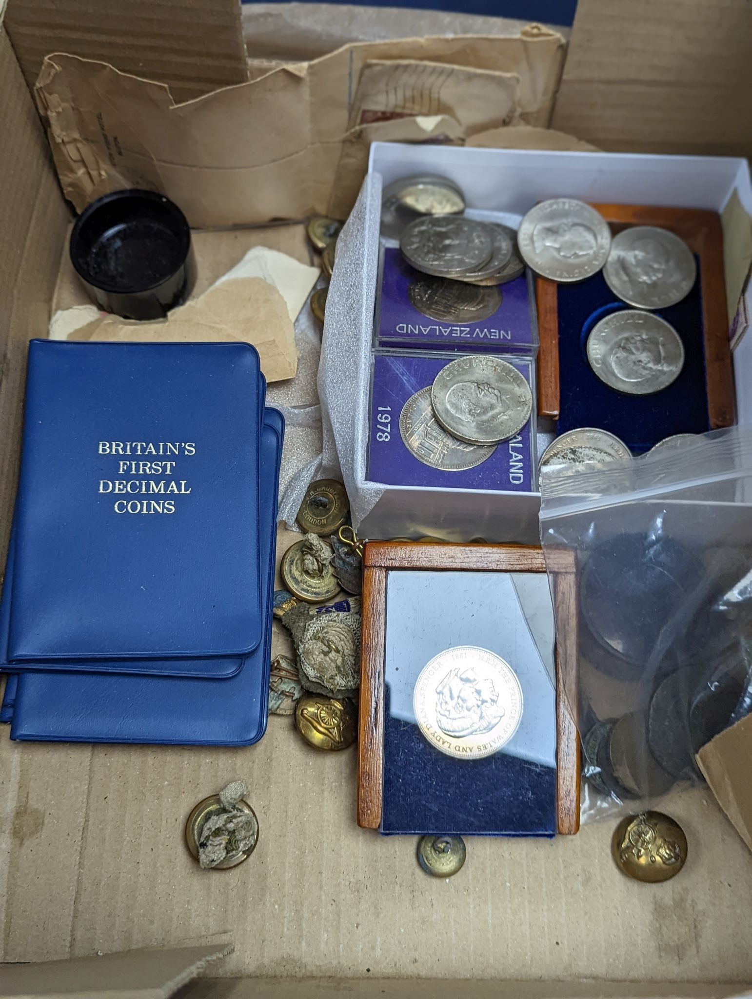 A collection of coins, commemorative Crowns, regimental buttons, etc.